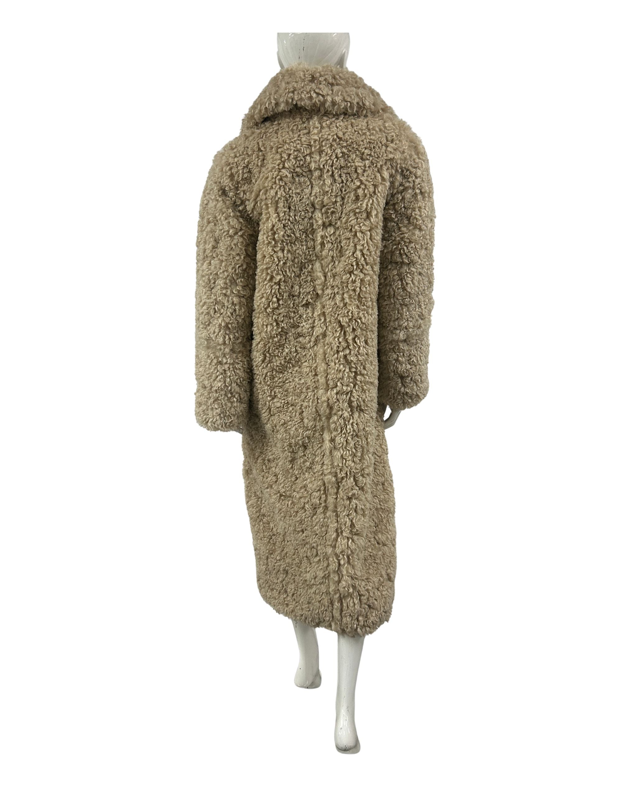 Beige teddy coat on a mannequin against a white background