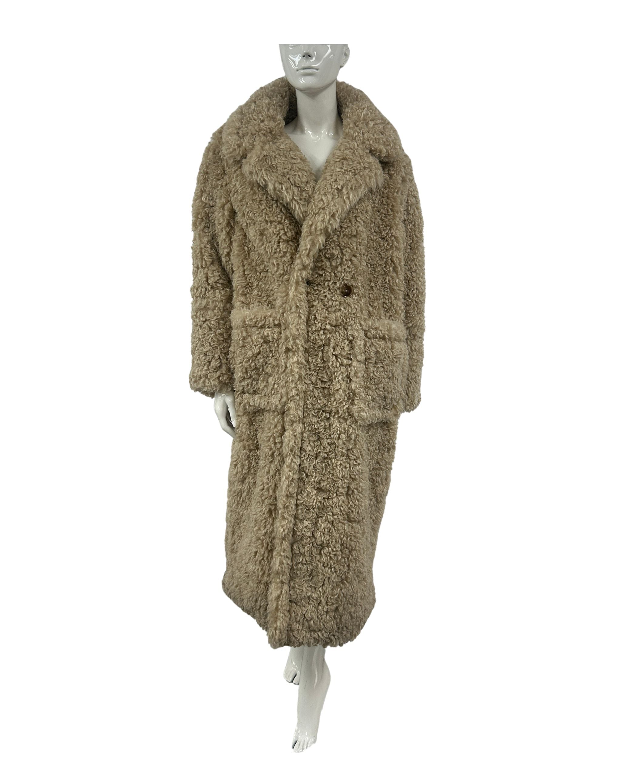 Mannequin wearing a brown textured coat on a white background