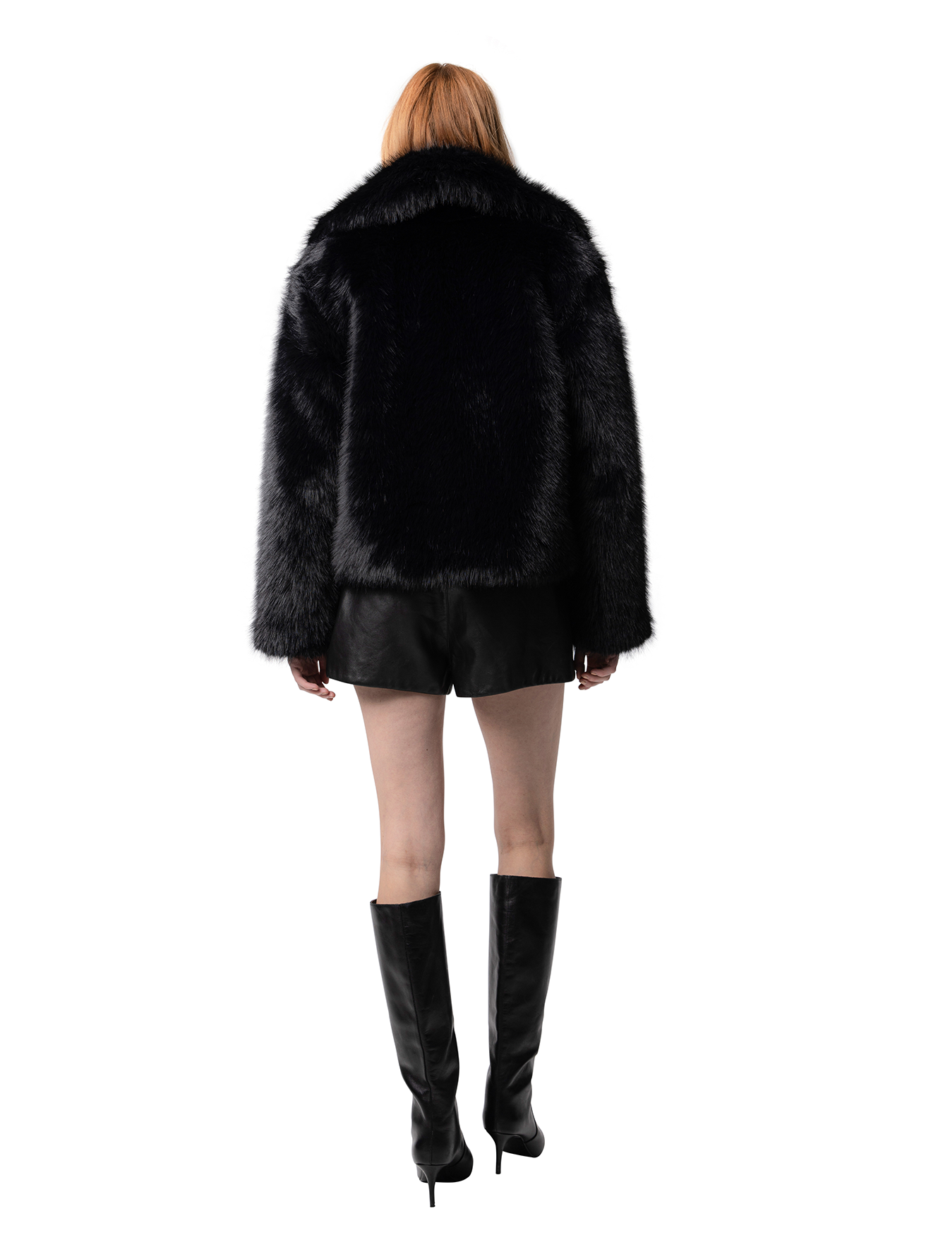 Back view — KELLY coat in Ink Black from behind, revealing smooth faux fur texture and minimalist silhouette.