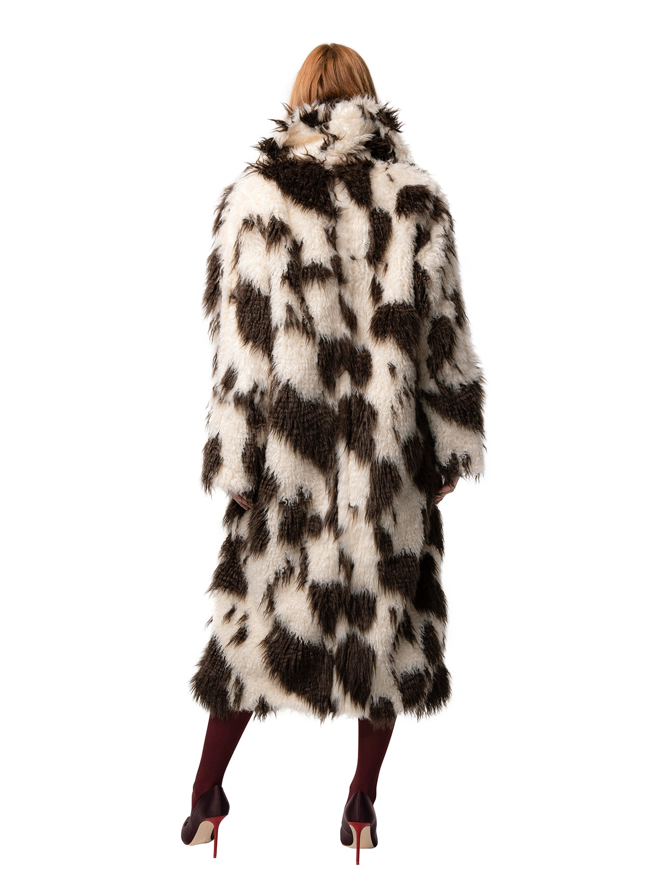 Back view — RUE coat in Crimped Cow seen from behind, showcasing the distinctive pattern and plush fabric.