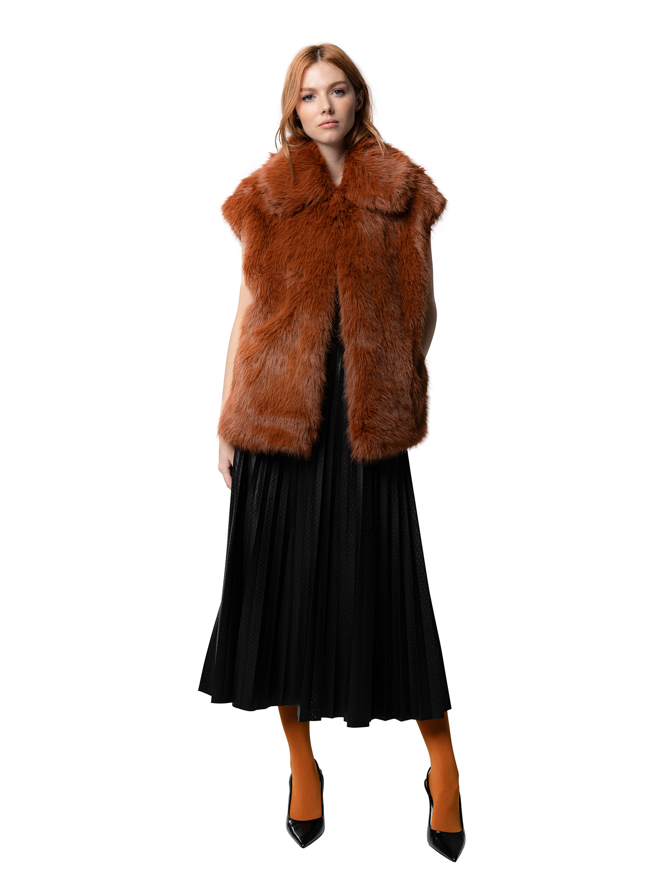 MIA coat in Rust — front view of long rust-coloured faux fur coat with clean lapels and softly tailored silhouette, crafted from cruelty-free materials.