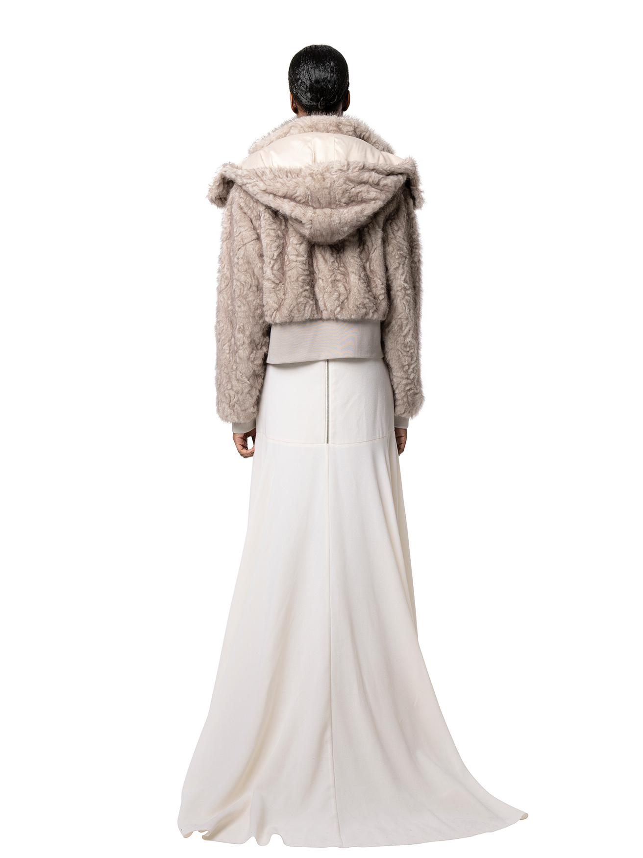 Back view — FIONA coat in Husky seen from behind, showcasing the oversized hood and rounded shape in soft grey faux fur.
