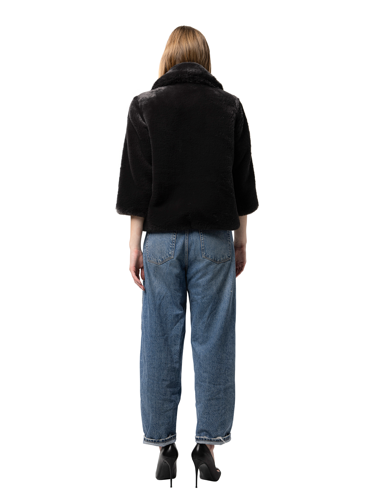 Back view — WENDY coat in Coal Black seen from behind, showcasing the smooth texture and deep black tone.