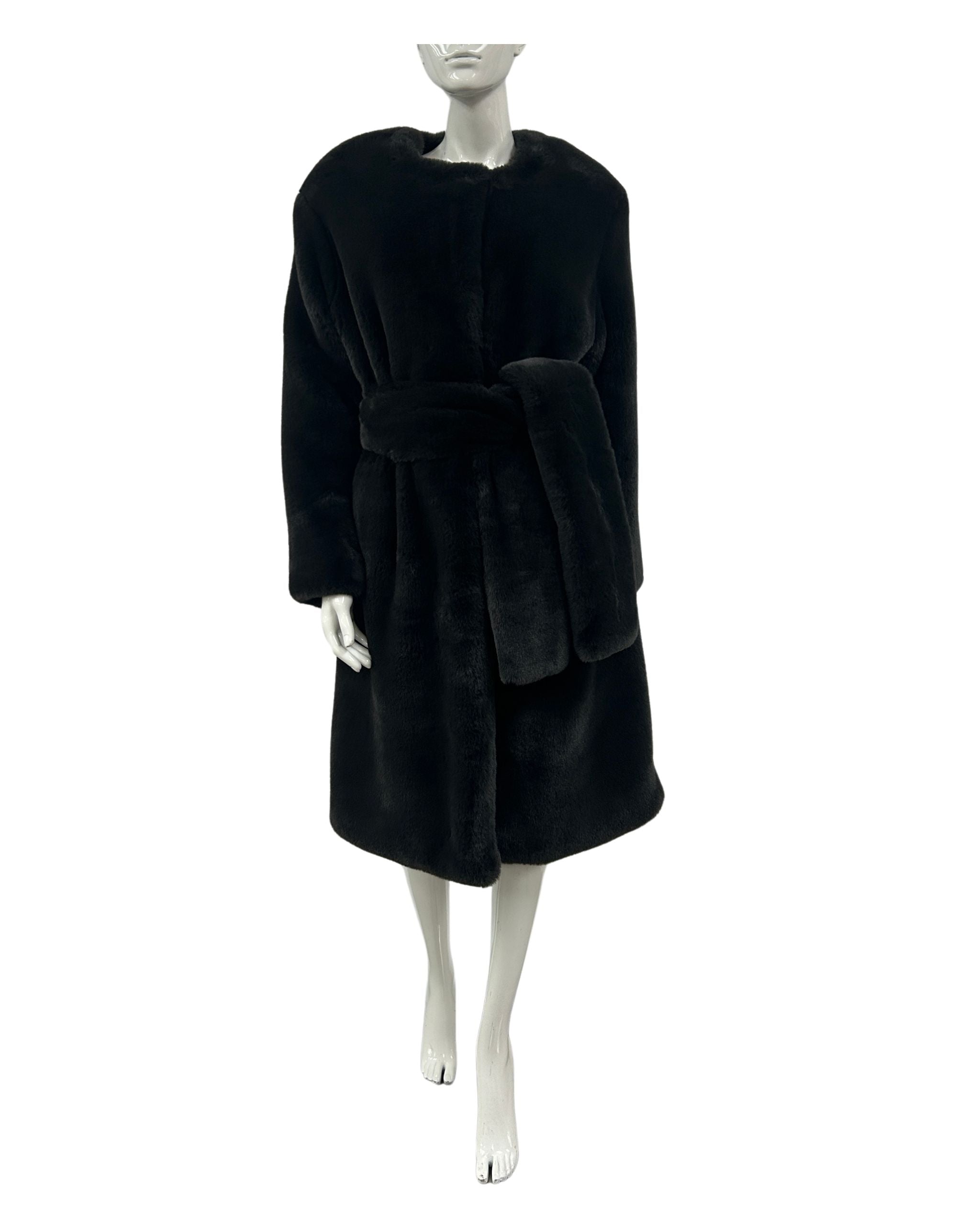 Black coat on a mannequin against a white background