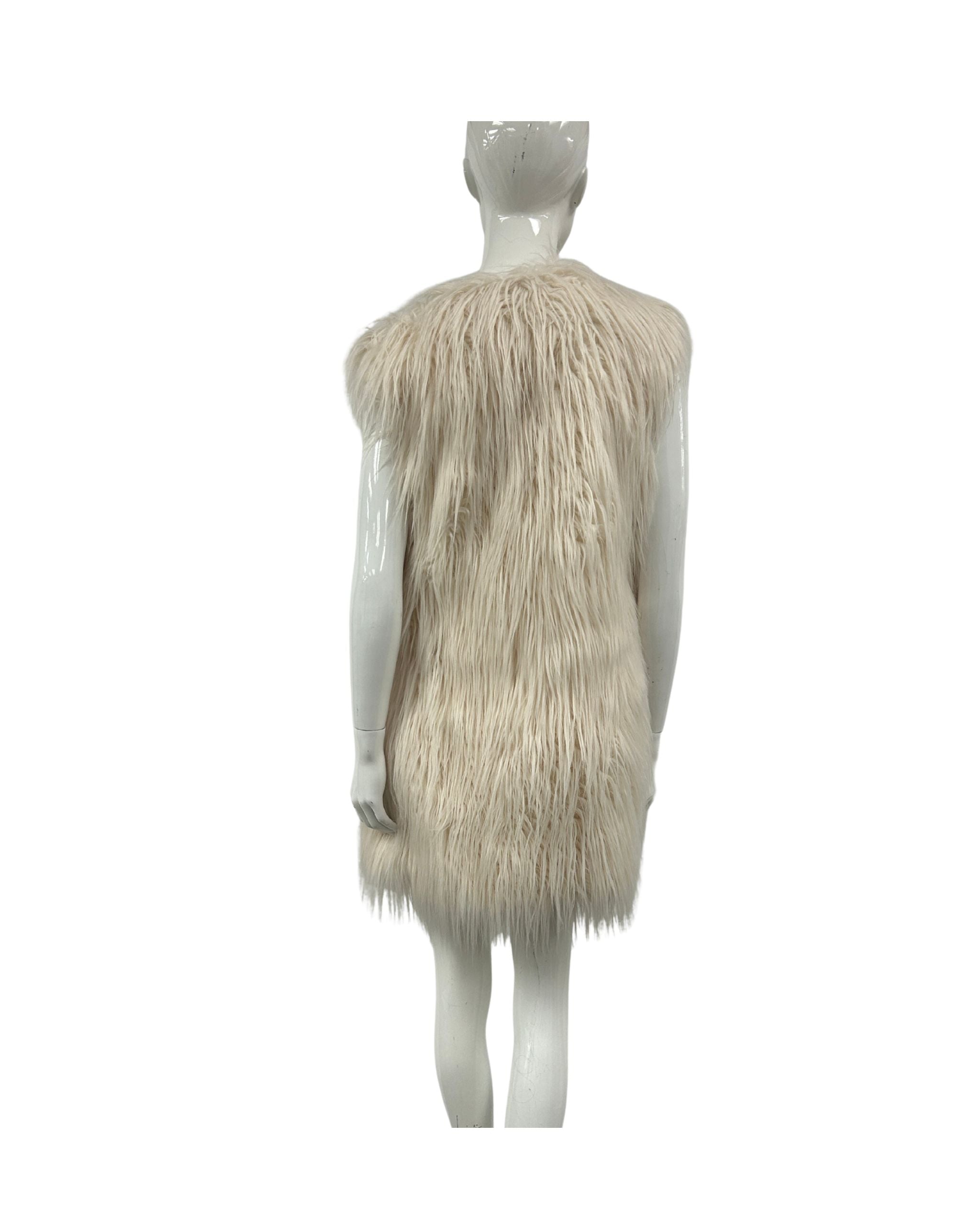 Mannequin wearing a beige fur vest on a white background