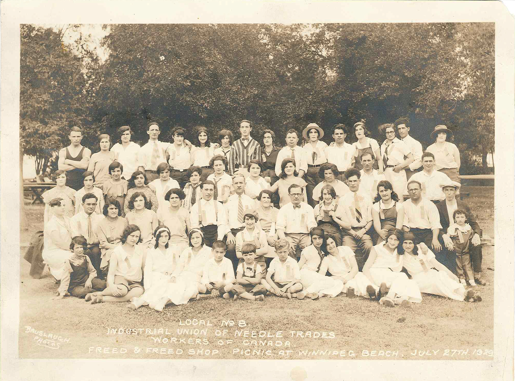 An old group photo of the Industrial Union of Needle Trades from 1929.