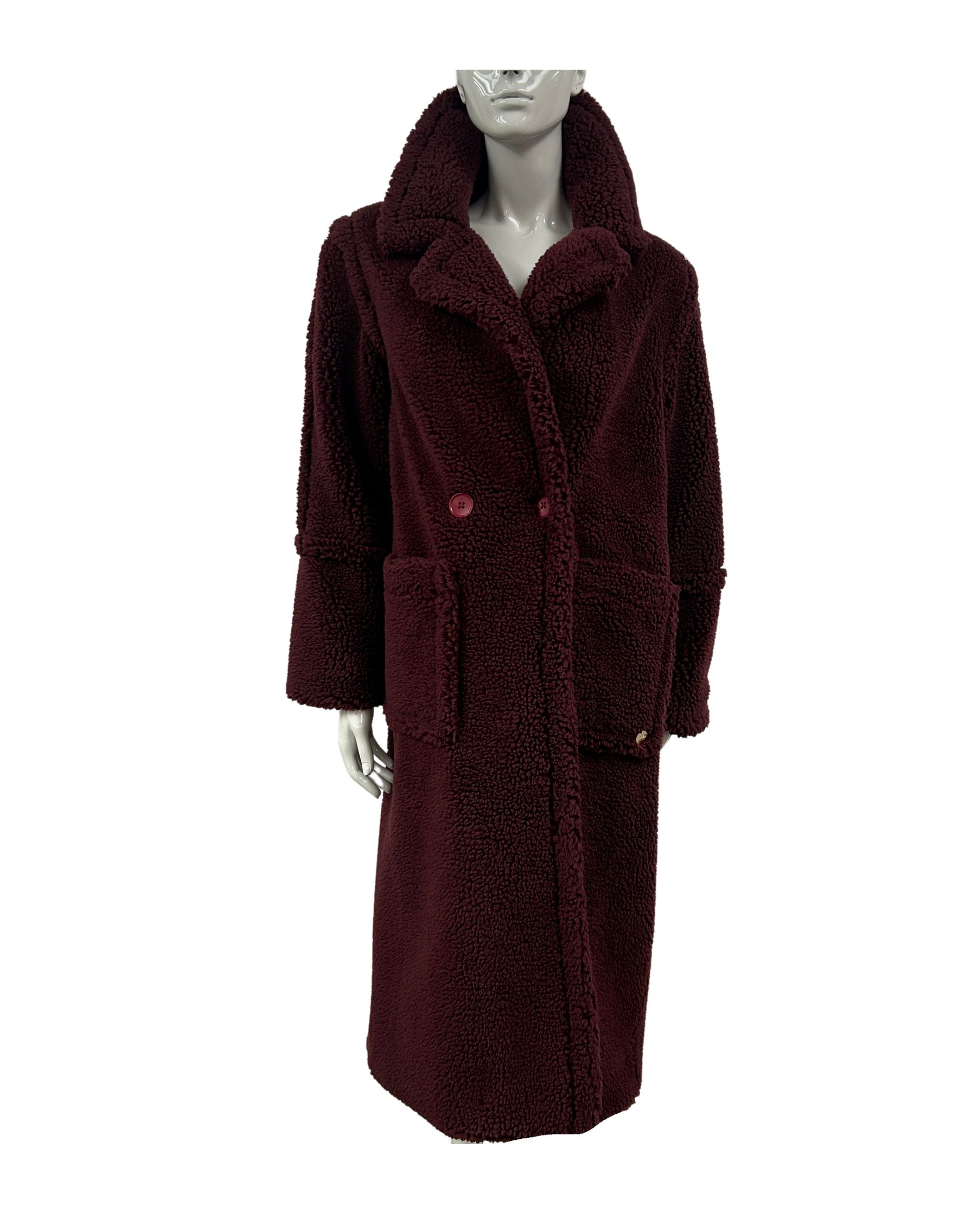 Mannequin wearing a long cranerry teddy faux fur coat on a white background