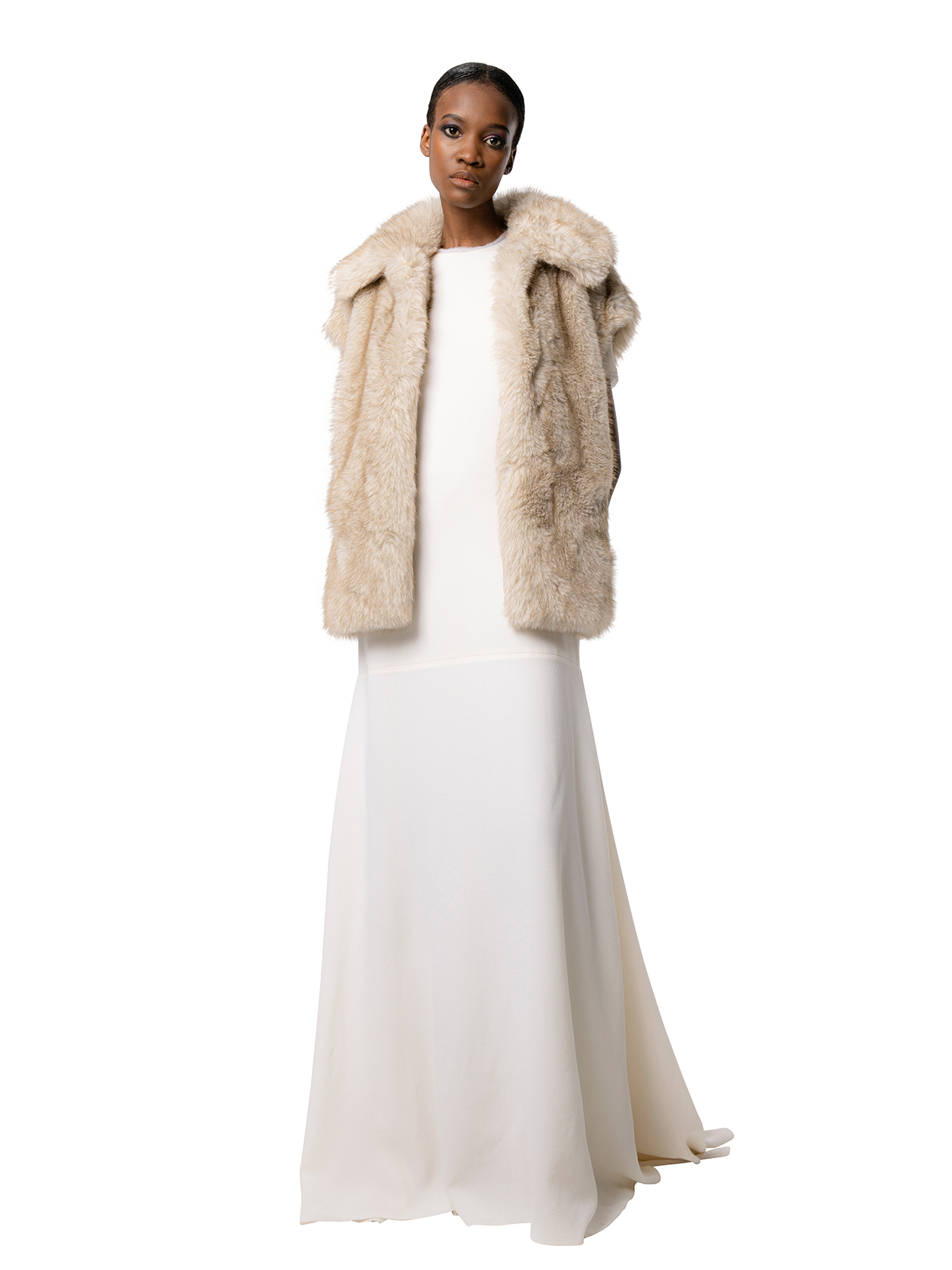 MIA coat in Fox — front view of long beige faux fur coat with clean lapels and a softly tailored silhouette, crafted from cruelty-free materials.