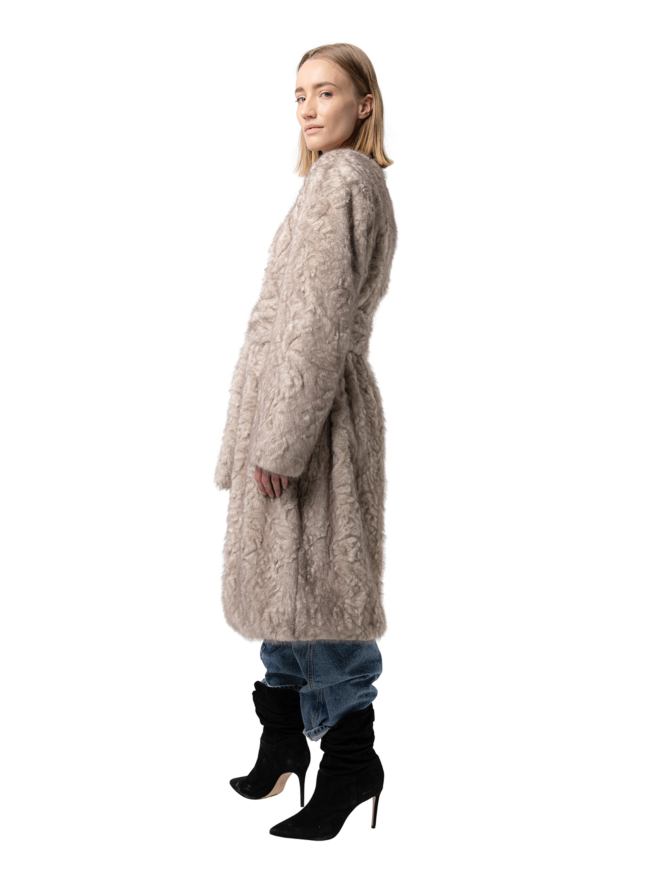 Side view — STELLA in Husky captured from the side, highlighting the plush cruelty-free fur, relaxed fit, and defined waist.