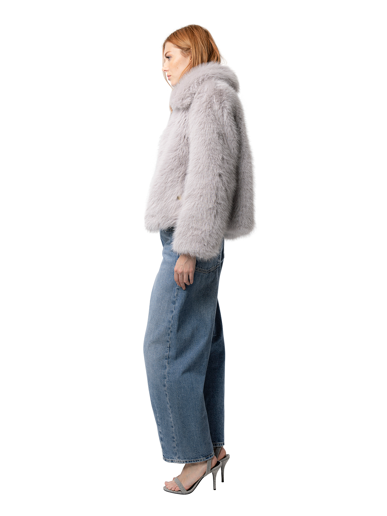 Side view — KELLY coat in Dove captured from the side, showcasing the soft structure and vegan leather contrast panel.
