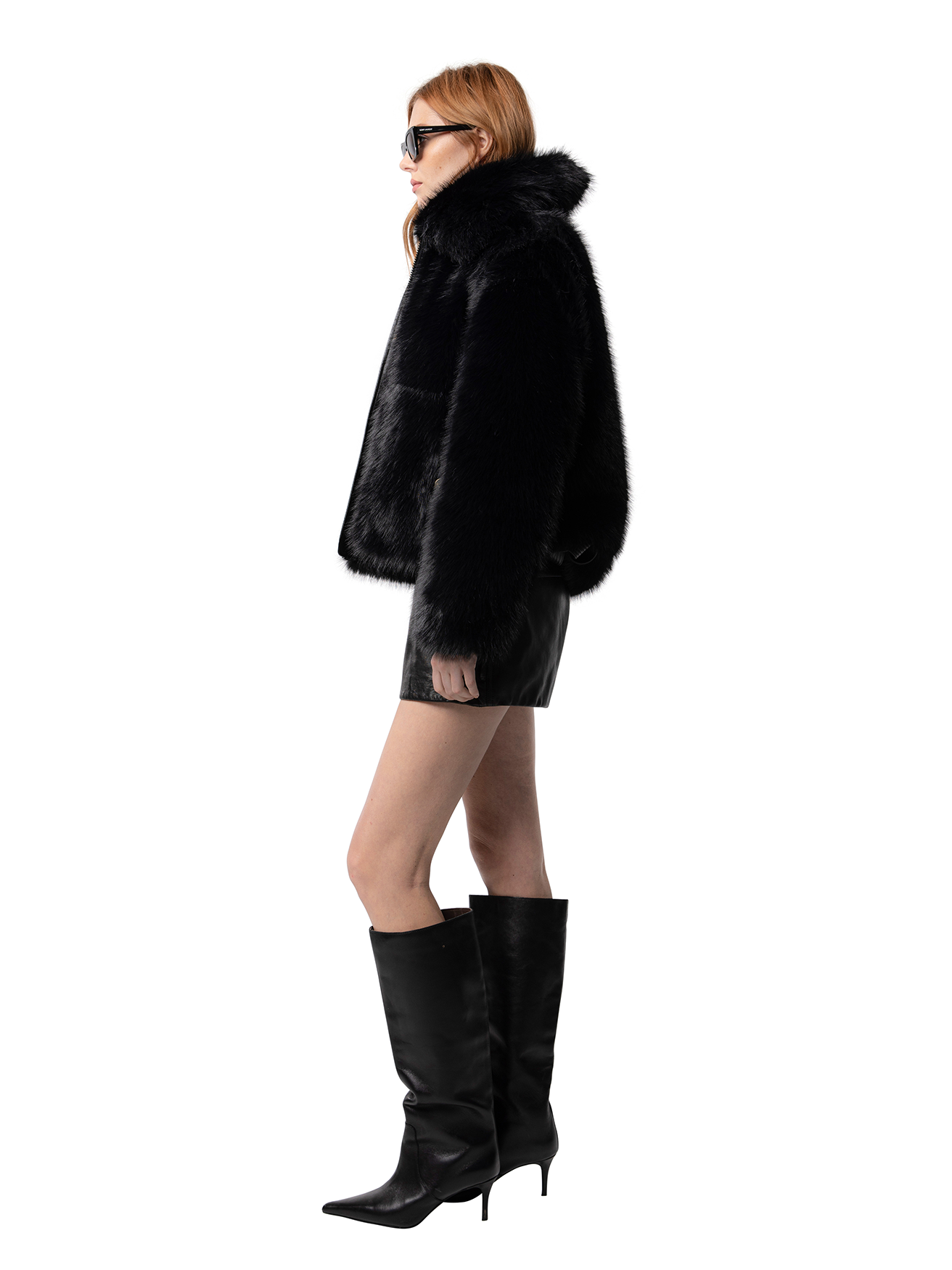 Side view — KELLY in Ink Black from the side, highlighting the contrast vegan leather and sculpted volume.