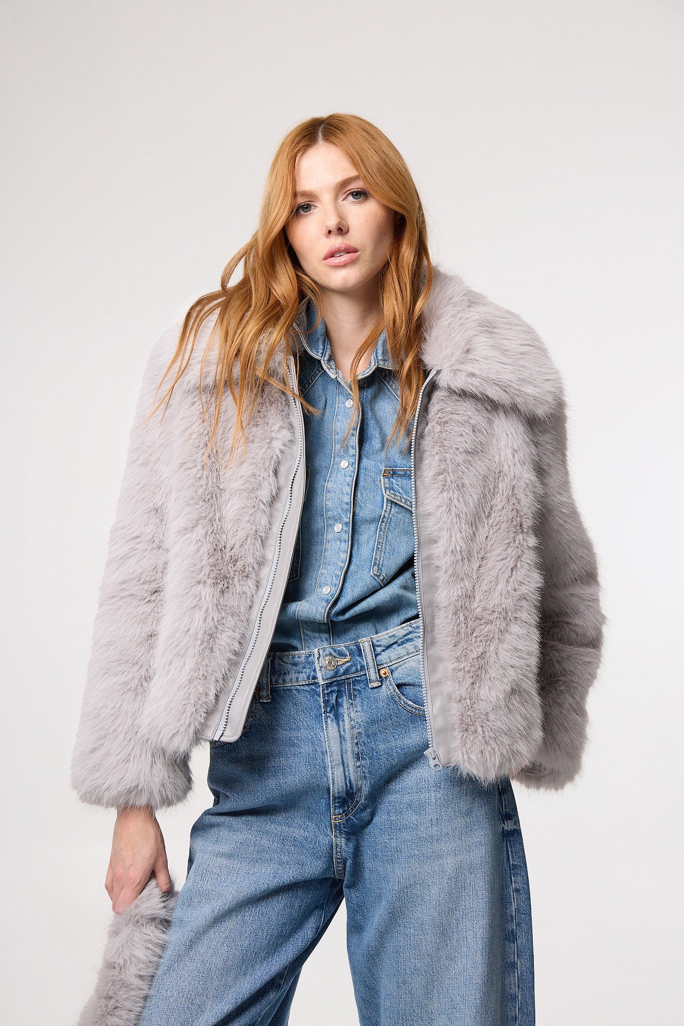 Editorial shot — KELLY in Dove styled editorially, worn with tailored layers to elevate the soft neutral tone and confident shape.