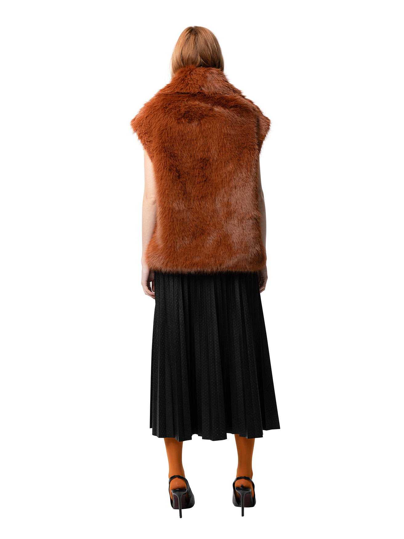 Back view — MIA coat in Rust seen from behind, showcasing the elongated cut and plush faux fur texture in a warm rust tone.