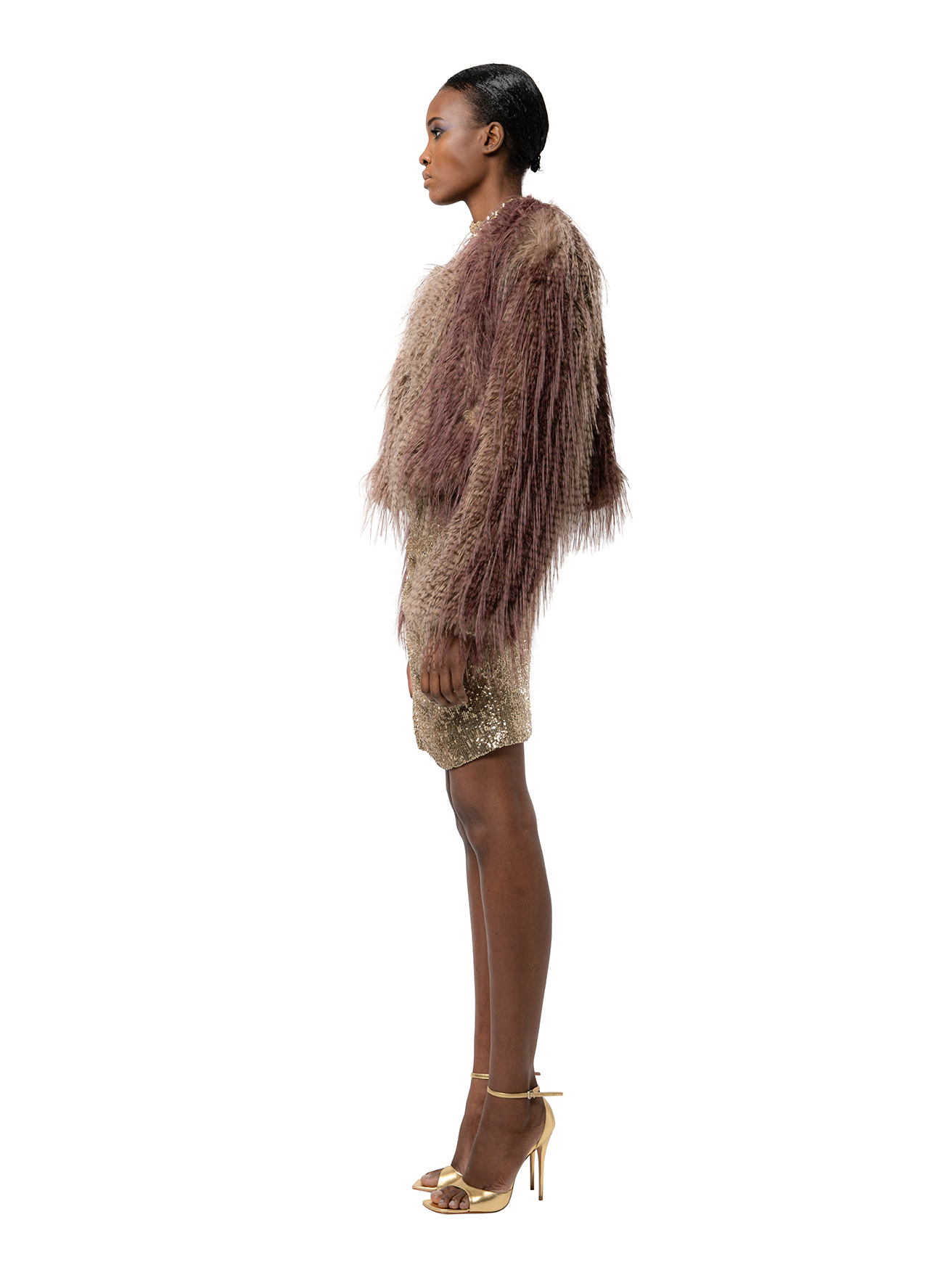 ANNA jacket in Ostrich — side profile showing cruelty-free textured fur, short hemline, and front pocket detail.