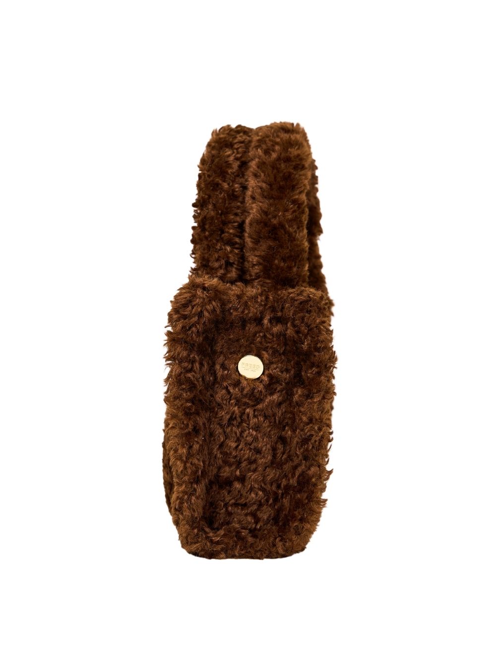 Side view — Mini Tote in Penny shown from the side, highlighting the soft curly sherpa texture and structured silhouette.