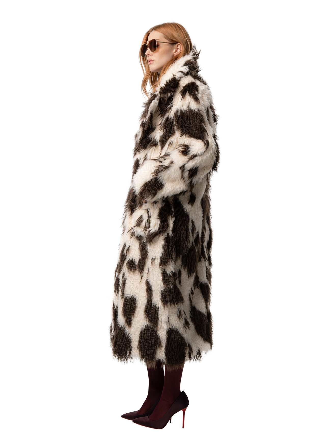 Side view — RUE in Crimped Cow shown from the side, highlighting the crimped faux fur texture and oversized fit.