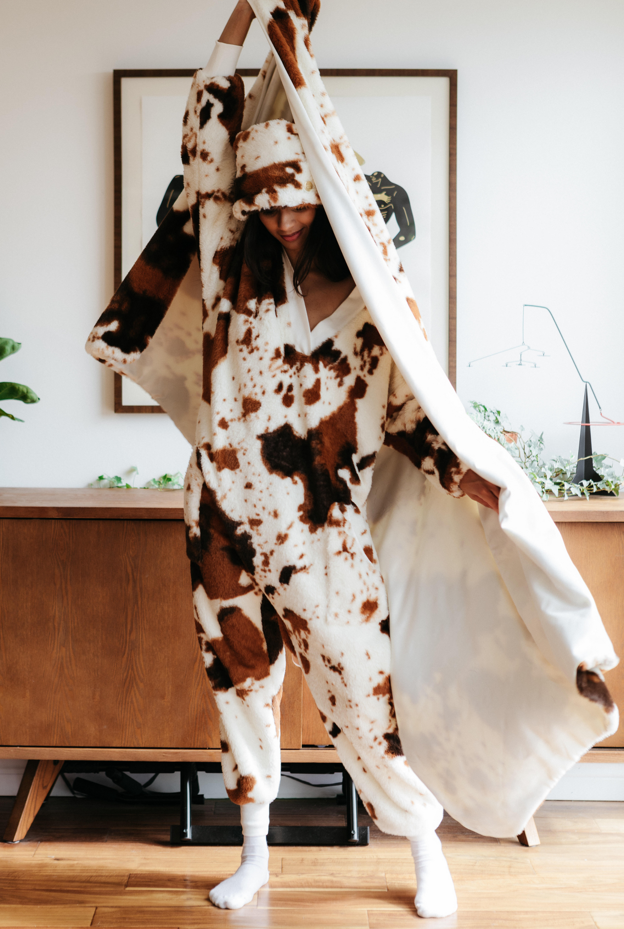 FAUX FUR ROMPER - COW PRINT