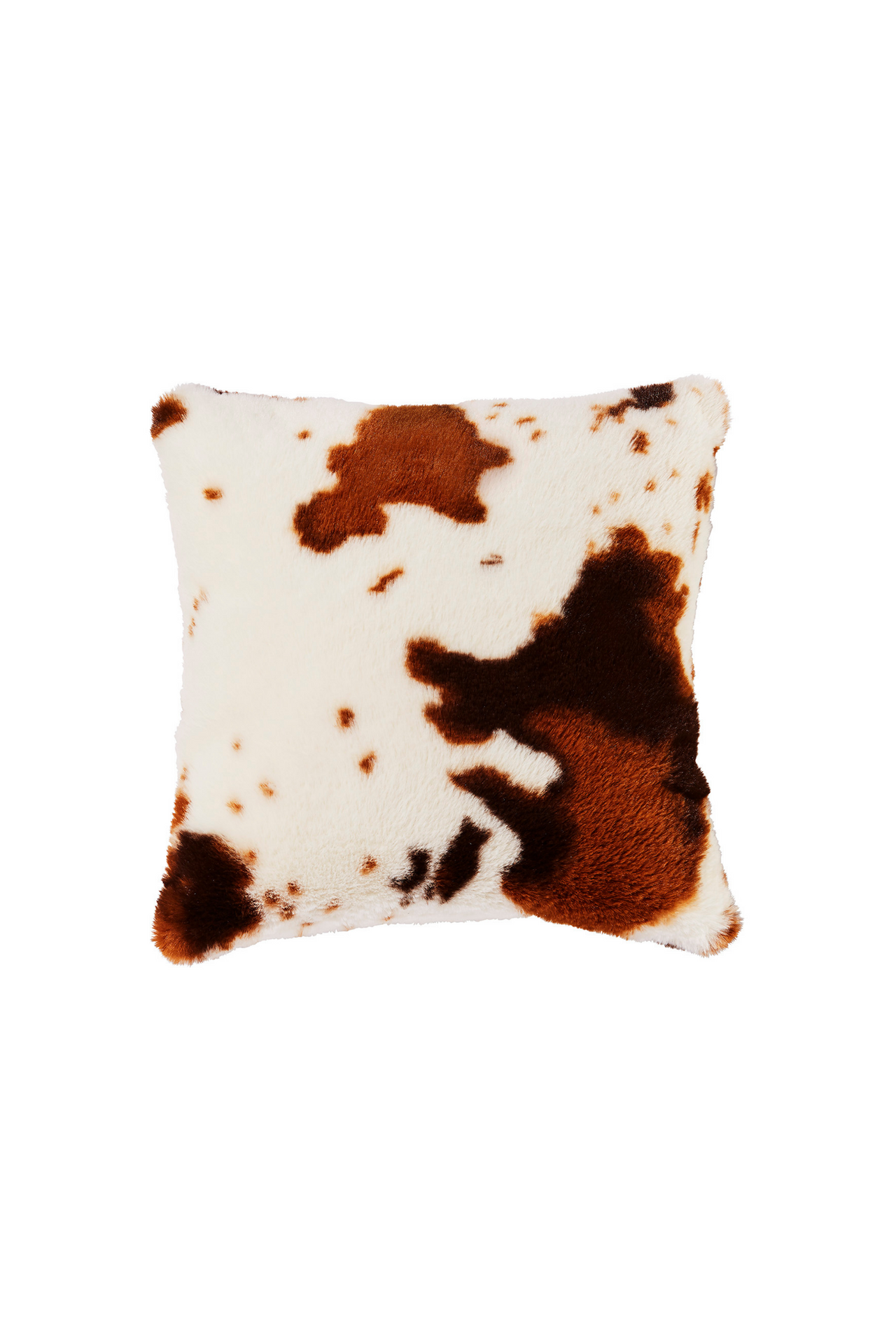 Faux fur throw pillow in brown and white cow print.