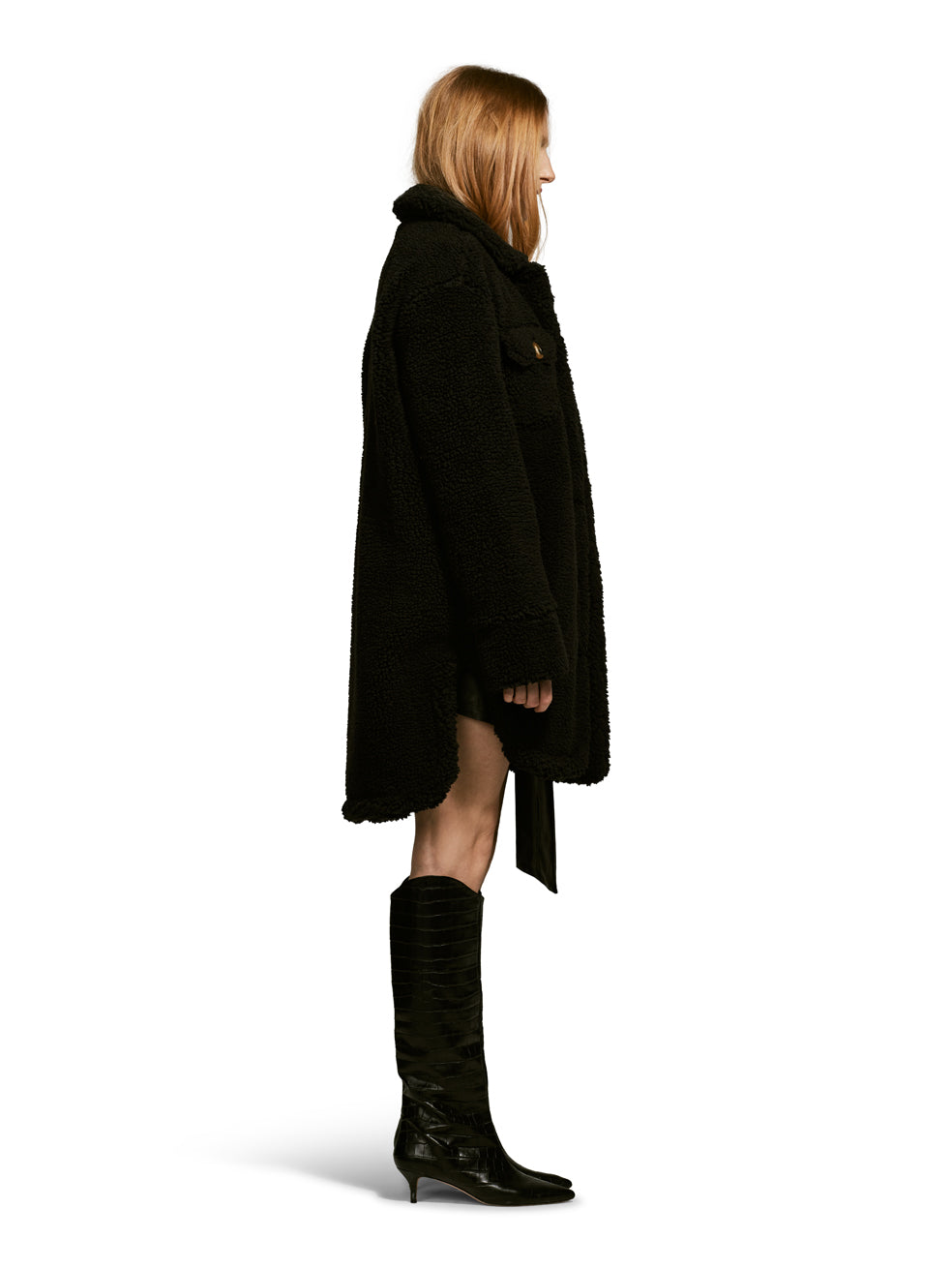 Model wearing the Ash, a teddy-inspired faux-fur sherpa shell with a laid-back silhouette in Charcoal.